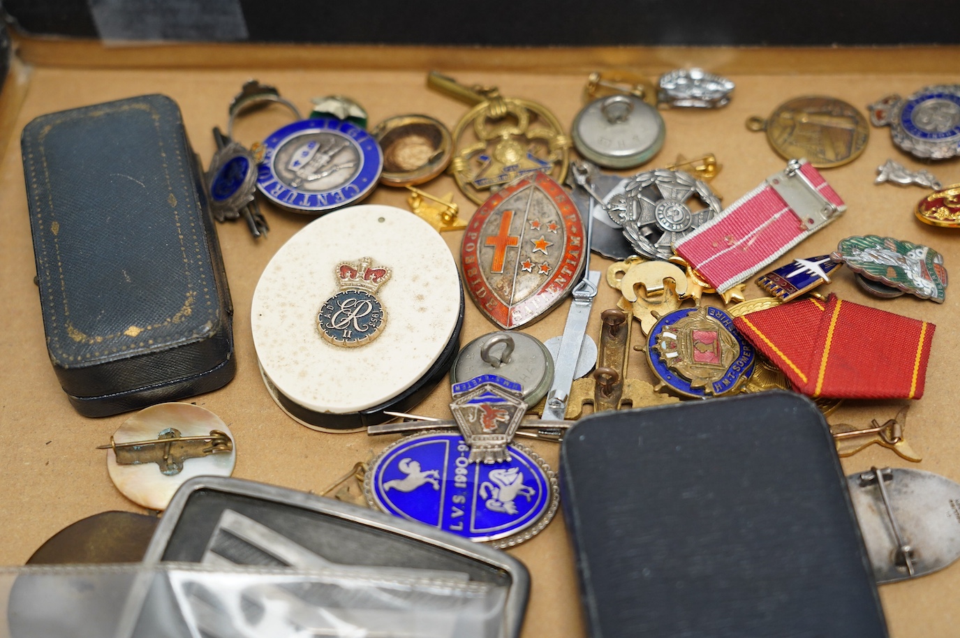 A collection of WWII sweetheart badges, silver badges, military buttons, RAF ephemera, a miniature OBE award, etc. Condition - fair to good